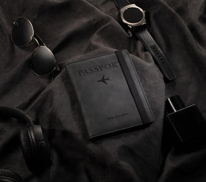 Passport wallet with secure elastic strap